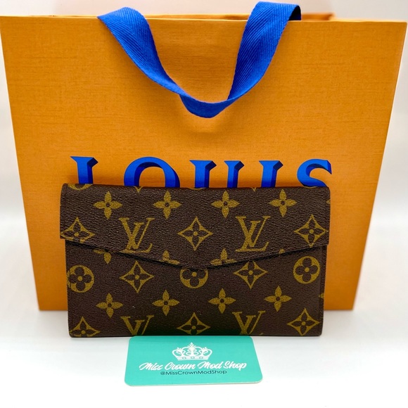 Louis Vuitton Clutch - Picture 1 of 16